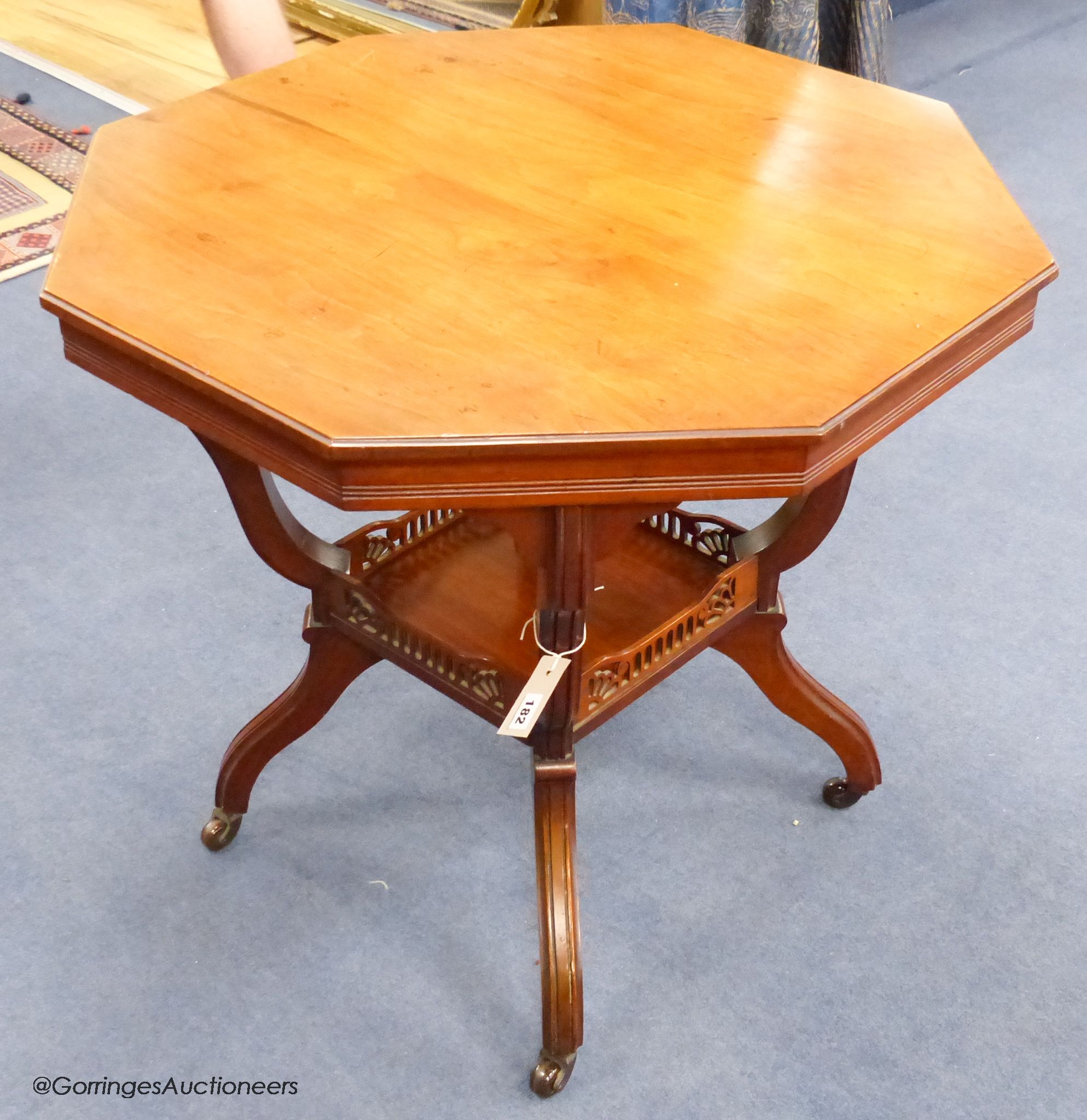 A Late Victorian walnut octagonal centre table, 75.5 cm wide, 69 cm high